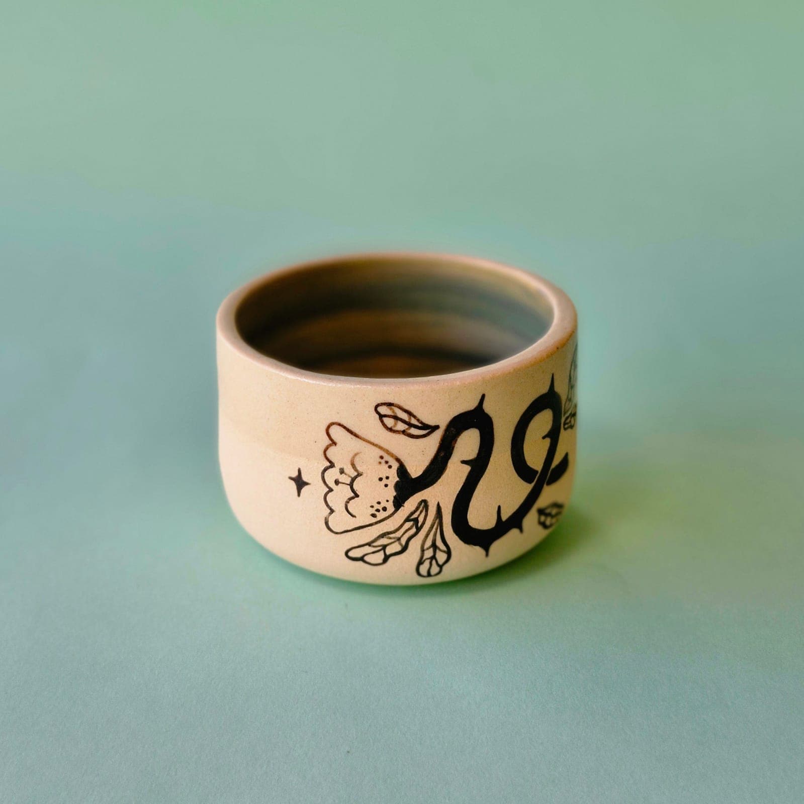 Taza pequeña flor