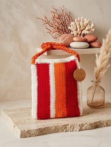 Bolso tejido rojo-naranja reversible