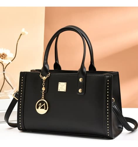 Cartera Bolso Elegante Con Remaches Y Colgante Metálico — imagen 1 de 3